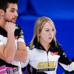 Colton and Kadriana Lott delivering a curling stone during the world mixed doubles curling championship in Calgary