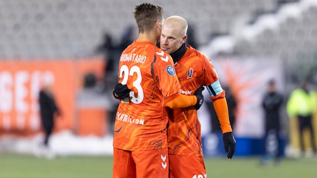 Two Forge FC players celebrate during the 2026 season opener against Atletico Ottawa
