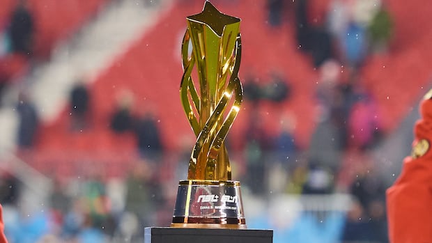 Golden NSL championship trophy displayed on a pedestal ahead of the league's second season and FIFA World Cup