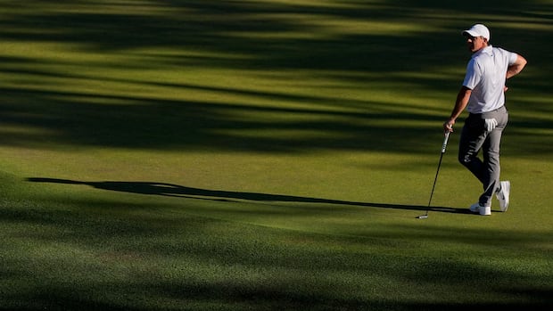Rory McIlroy lining up a shot on the 16th hole during the Masters second round at Augusta National Golf Club