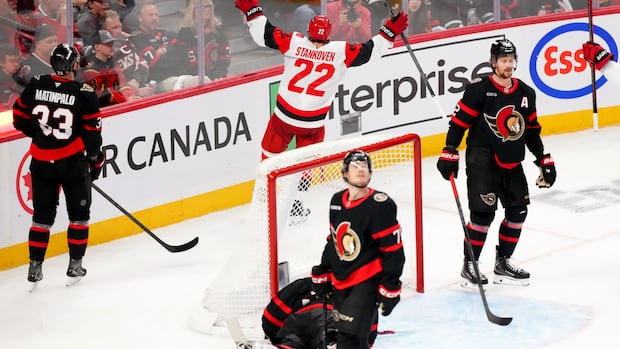 Carolina Hurricanes center Logan Stankoven celebrates goal against Ottawa Senators goalie Linus Ullmark in NHL playoff game