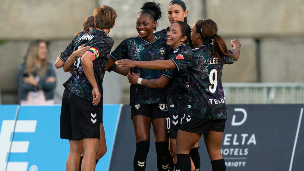 Vancouver Rise's Latifah Abdu celebrates with teammates after scoring a goal against AFC Toronto in April 2026