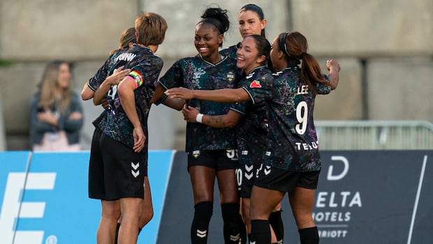 Vancouver Rise players celebrate together after scoring a goal in their match against Halifax Tides