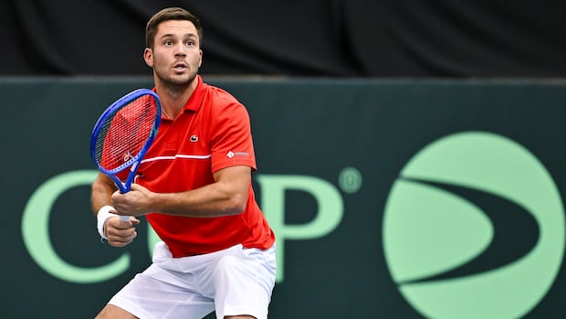 Canadian tennis player Antoine Galarneau ready to return serve during French Open qualification match