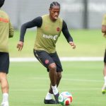 Soccer player practicing on field preparing for upcoming match ahead of World Cup team announcement