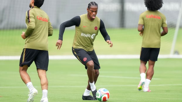 Soccer player practicing on field preparing for upcoming match ahead of World Cup team announcement