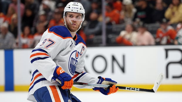Connor McDavid of the Edmonton Oilers focused on the ice during the third period against the Anaheim Ducks in 2026 playoffs