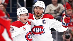 Montreal Canadiens’ Suzuki Wins Selke Trophy, Caufield Takes Lady Byng