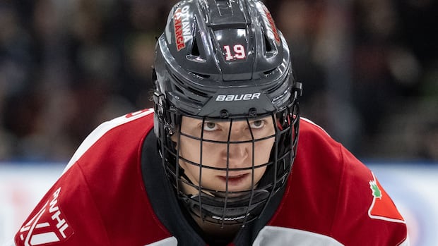 Brianne Jenner of Ottawa Charge skating on the ice in hockey gear during a game