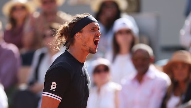Alexander Zverev celebrates a break of serve against Flavio Cobolli in the 2026 French Open men's final at Roland Garros
